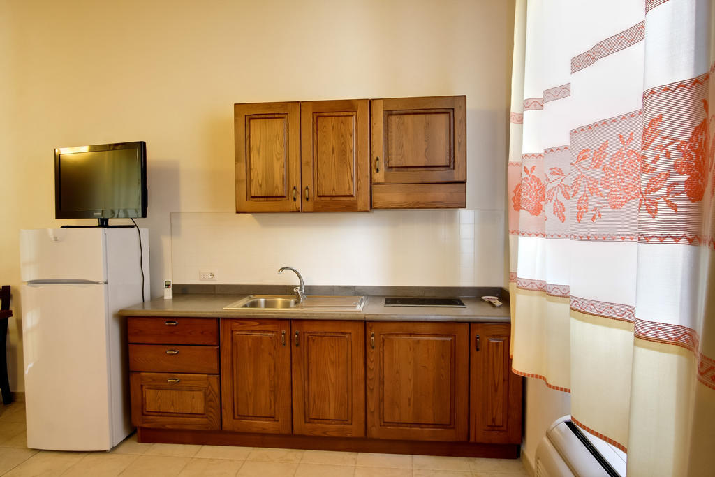 La Corte Dei Rei Aparthotel Castiadas Habitación foto