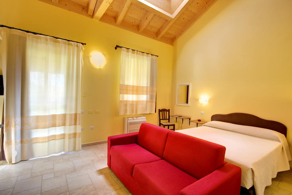 La Corte Dei Rei Aparthotel Castiadas Habitación foto
